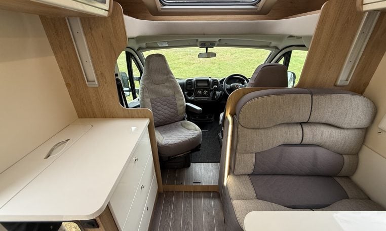 2023 Roller Team Auto-Roller 747 motorhome interior view showing the front cab swivel seats.