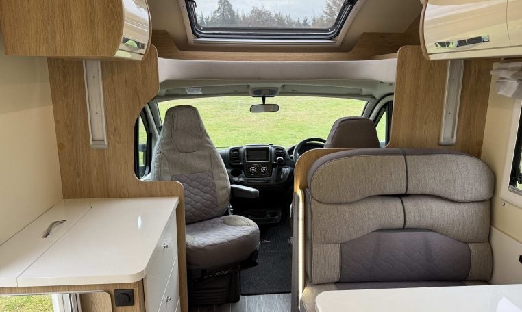 2023 Roller Team Auto-Roller 747 motorhome interior view showing the front cab swivel seats.