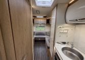 2023 Roller Team Auto-Roller 747 motorhome interior view showing the front dinette and kitchen.