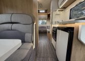 2023 Roller Team Auto-Roller 747 motorhome interior view showing the front dinette and kitchen.