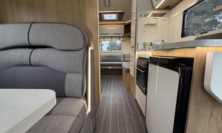 2023 Roller Team Auto-Roller 747 motorhome interior view showing the front dinette and kitchen.