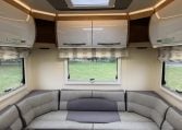 2023 Roller Team Auto-Roller 747 motorhome interior showing the rear lounge overhead storage.