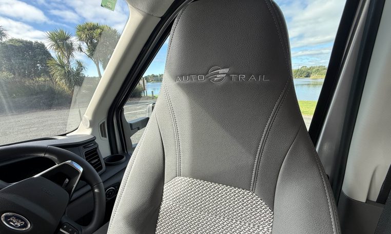 Auto-Trail F74 Motorhome captain chairs with quality fabric upholstery.