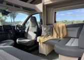 Auto-Trail F74 Motorhome front dining with electric drop-down bed