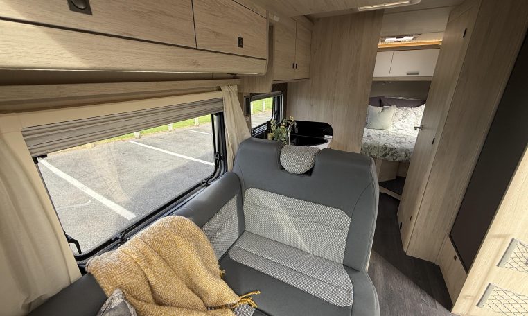 Auto-Trail F74 Motorhome front dining area with foldaway table