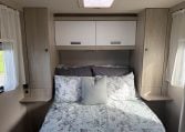Auto-Trail F74 bedroom showing the rear island bed.
