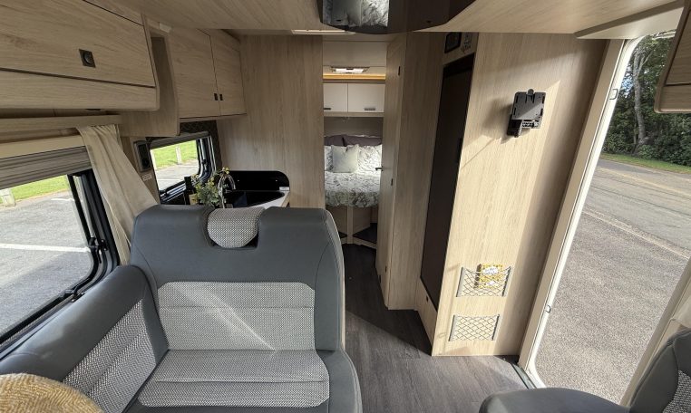 Auto-Trail F74 interior viewing showing the front dining area.