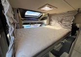 2024 Auto-Trail F-Line F62 motorhome interior view showing the drop-down bed for lowered.