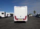 Rear view of the Auto-Trail Frontier Comanche motorhome displaying overall back profile and exterior details.