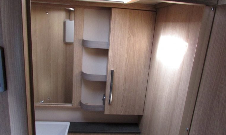 2024 Auto-Trail Frontier Comanche motorhome bathroom mirror above a compact sink.