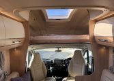 2024 Auto-Trail Frontier Comanche interior showing the bed over the front cab.