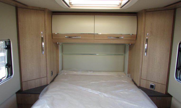 2024 Auto-Trail Frontier Comanche motorhome interior view showing the bedroom overhead storage.
