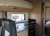 2024 Auto-Trail Frontier Comanche motorhome interior view showing the kitchen overhead storage.