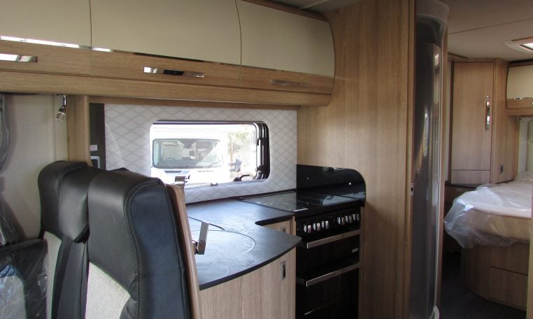 2024 Auto-Trail Frontier Comanche motorhome interior view showing the kitchen overhead storage.