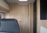 2024 Auto-Trail Frontier Comanche motorhome interior view showing the closed privacy bedroom door.