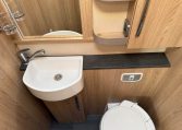 2024 Auto-Trail Frontier Comanche interior showing the toilet and handbasin setup.