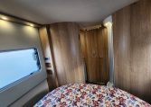 2024 Auto-Trail Frontier Delaware motorhome interior showing the bedroom door closed for privacy.