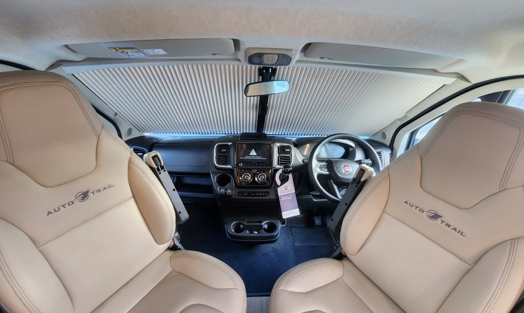 2024 Auto-Trail Frontier Delaware motorhome interior showing the swivel captain's chairs.