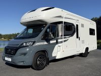 Auto-Trail Scout Motorhome exterior view next to a lake