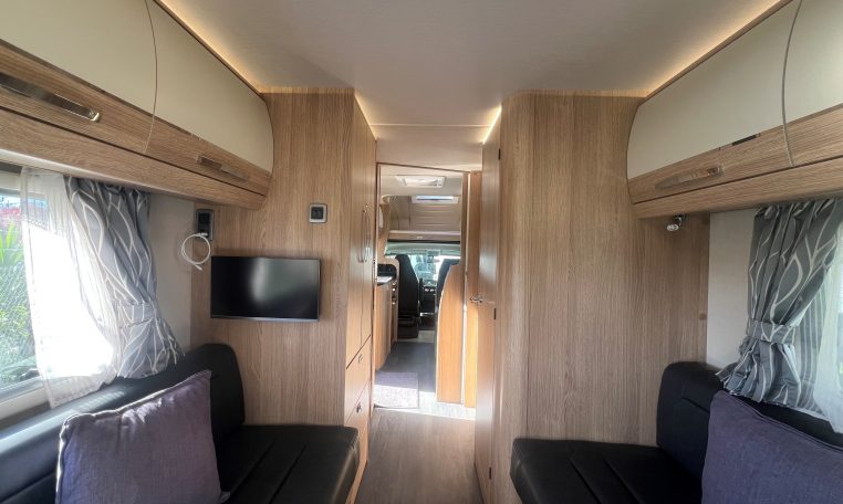 2024 Auto-Trail Frontier Scout interior view showing the TV in the rear lounge.
