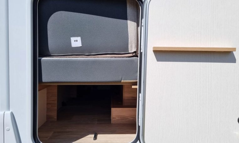 Fiat Ducato Pilote P696U exterior showing the rear storage locker.