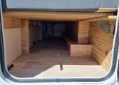 Fiat Ducato Pilote P696U exterior showing the extra storage compartment at the rear of the motorhome.