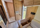 Fiat Ducato Pilote P696U interior showing the extra storage compartment in the arm rest.
