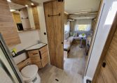 Fiat Ducato Pilote P696U interior showing the bathroom with handbasin.