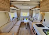 Fiat Ducato Pilote P696U interior showing the spacious rear lounge.