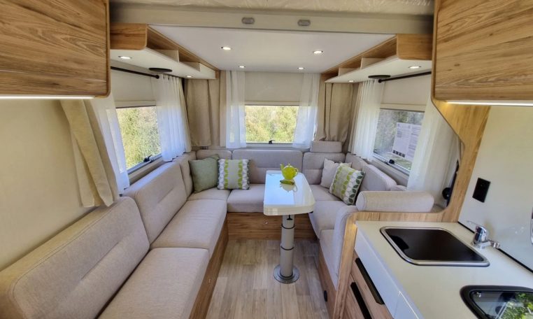 Fiat Ducato Pilote P696U interior showing the spacious rear lounge.