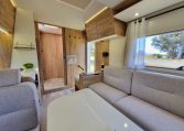 Fiat Ducato Pilote P696U interior showing the overhead storage in the rear lounge.