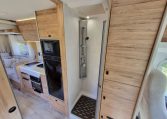 Fiat Ducato Pilote P696U interior showing the spacious separate shower.