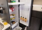 Compact Roller Team Zefiro 665 motorhome fridge/freezer designed for efficient food and drink storage.