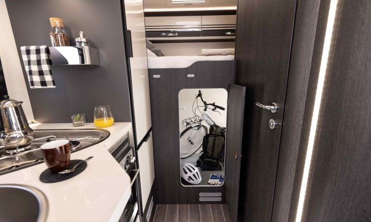 Interior view of the large rear boot in a Roller Team Zefiro 665 motorhome for storing equipment and luggage.