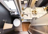 Spacious separate shower inside the Roller Team Zefiro 665 motorhome, featuring modern fittings and bright lighting.