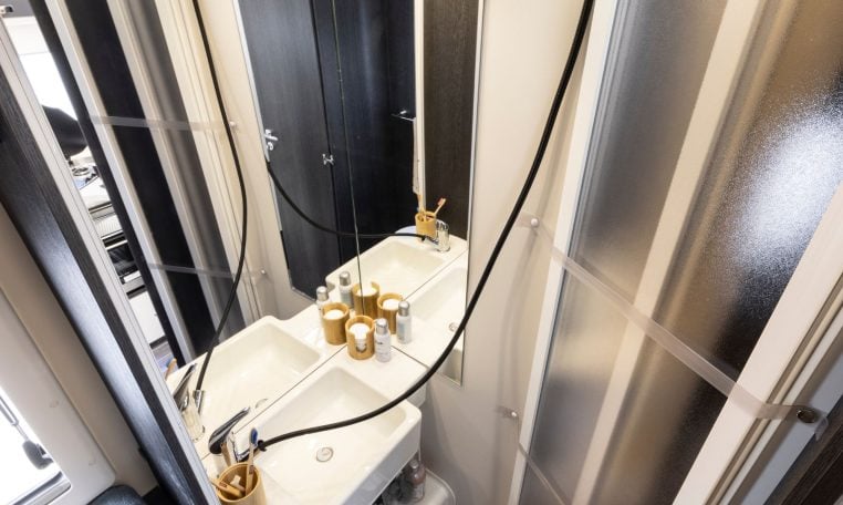 Flexible bathroom shower hose in a Roller Team Zefiro 665 motorhome provides smooth water flow, durability and easy use for daily shower comfort!