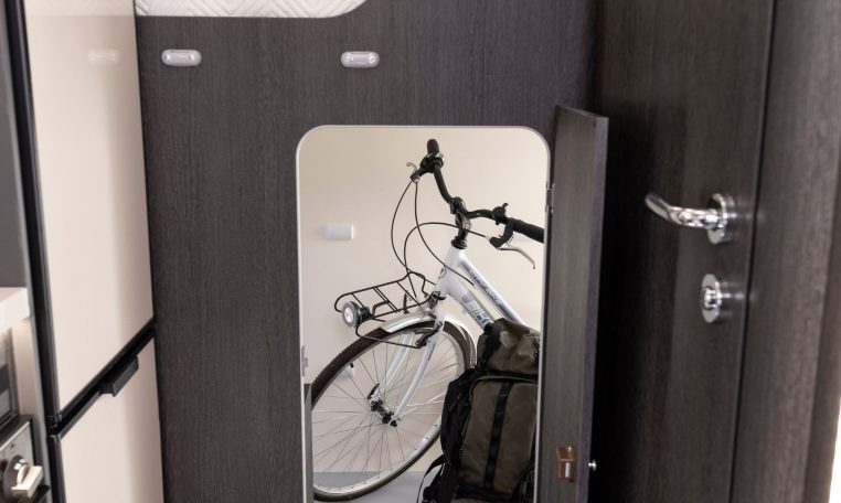 Interior view of the large garage in a Roller Team Zefiro 665 motorhome for storing equipment and luggage.