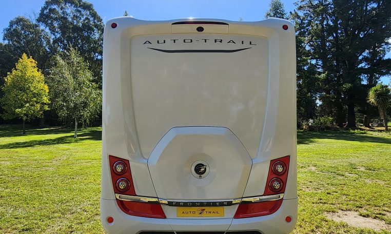 2025 Auto-Trail Comanche exterior showing the rear side of the motorhome.
