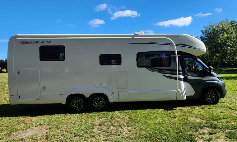 2025 Auto-Trail Comanche exterior showing the driver's side of the motorhome.