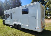 2025 Auto-Trail Comanche exterior showing the side and back of the motorhome.