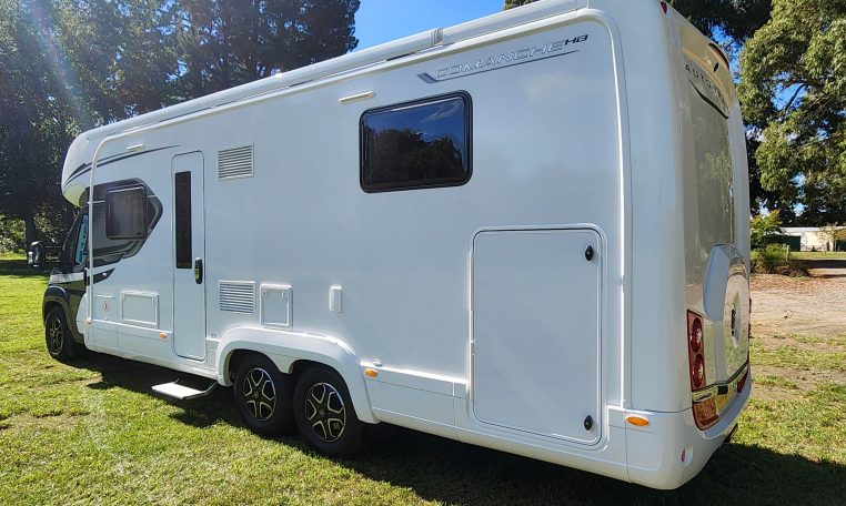 2025 Auto-Trail Comanche exterior showing the side and back of the motorhome.