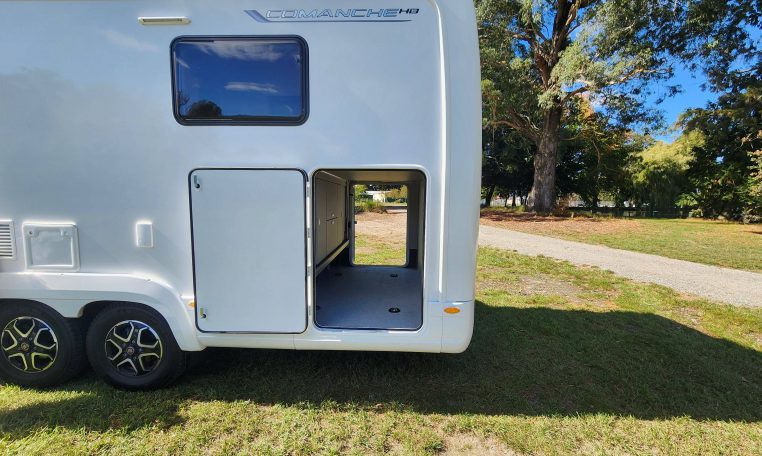 2025 Auto-Trail Comanche motorhome exterior showing the rear boot locker.