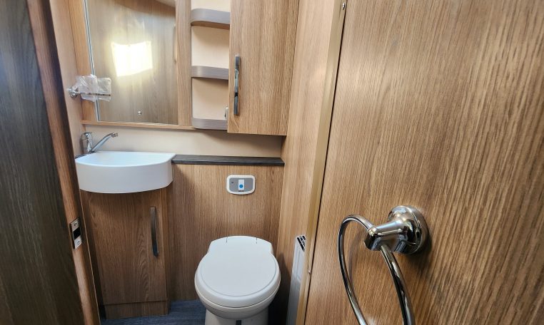 2025 Auto-Trail Comanche interior view showing the compact toilet.