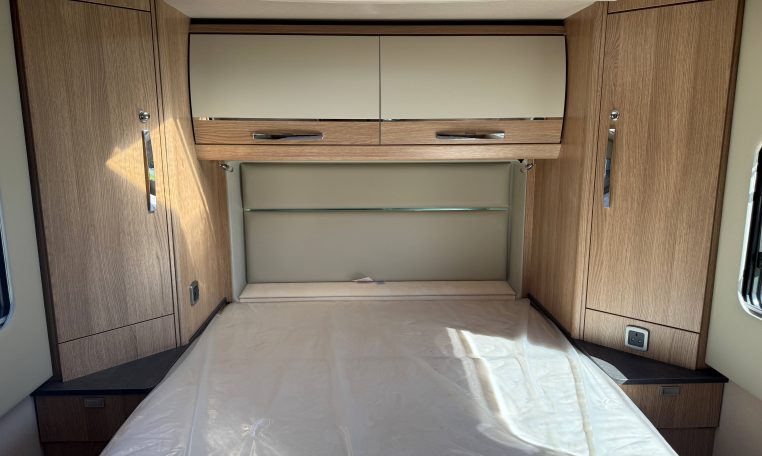 2025 Auto-Trail Frontier Comanche interior view of the overhead storage in the bedroom.