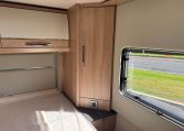 2025 Auto-Trail Frontier Comanche interior view of the side cupboard in the bedroom.