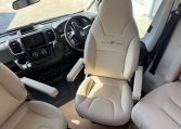 2025 Auto-Trail Frontier Comanche interior view showing the captain swivel seats.