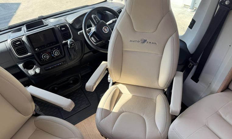 2025 Auto-Trail Frontier Comanche interior view showing the captain swivel seats.