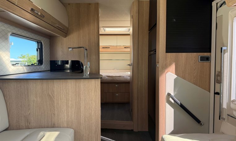 2025 Auto-Trail Frontier Comanche interior view showing the entry handrail.