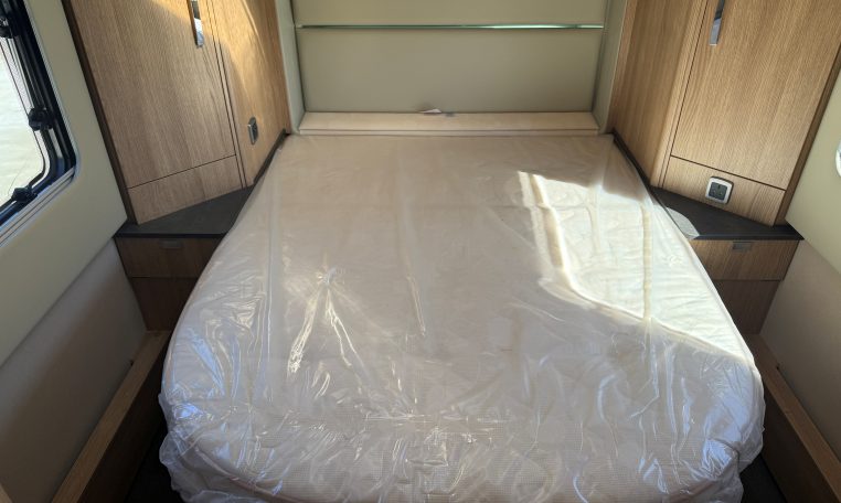 2025 Auto-Trail Frontier Comanche interior view showing the fixed rear island bed.