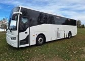 Exterior view of a BCI Classmaster bus passenger entry door used for boarding and exiting.